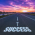 success-in-the-asphalt-road-at-the-sunset